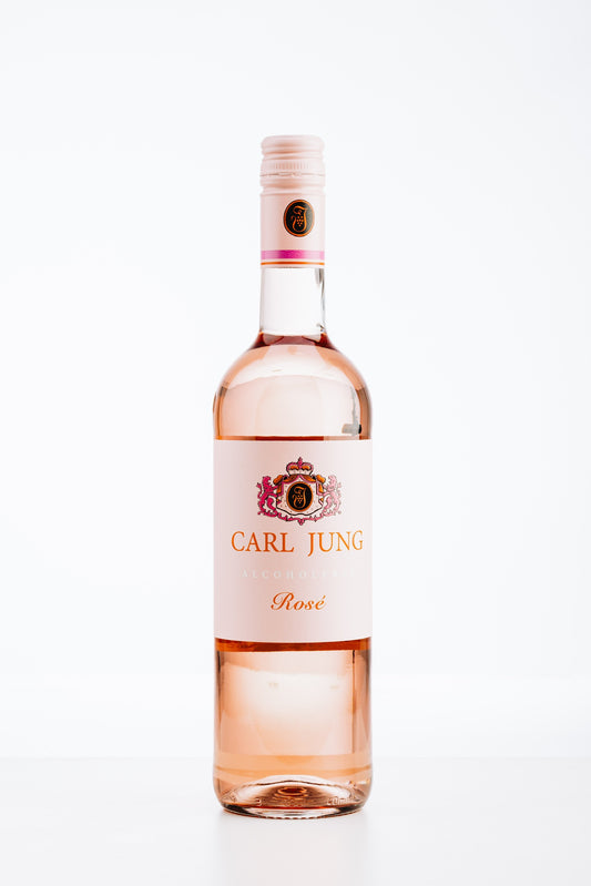 Carl Jung Rosé alkoholfrei – Flasche mit pinkfarbenem Etikett und zart roséfarbener Flüssigkeit, klassischer alkoholfreier Roséwein aus Deutschland