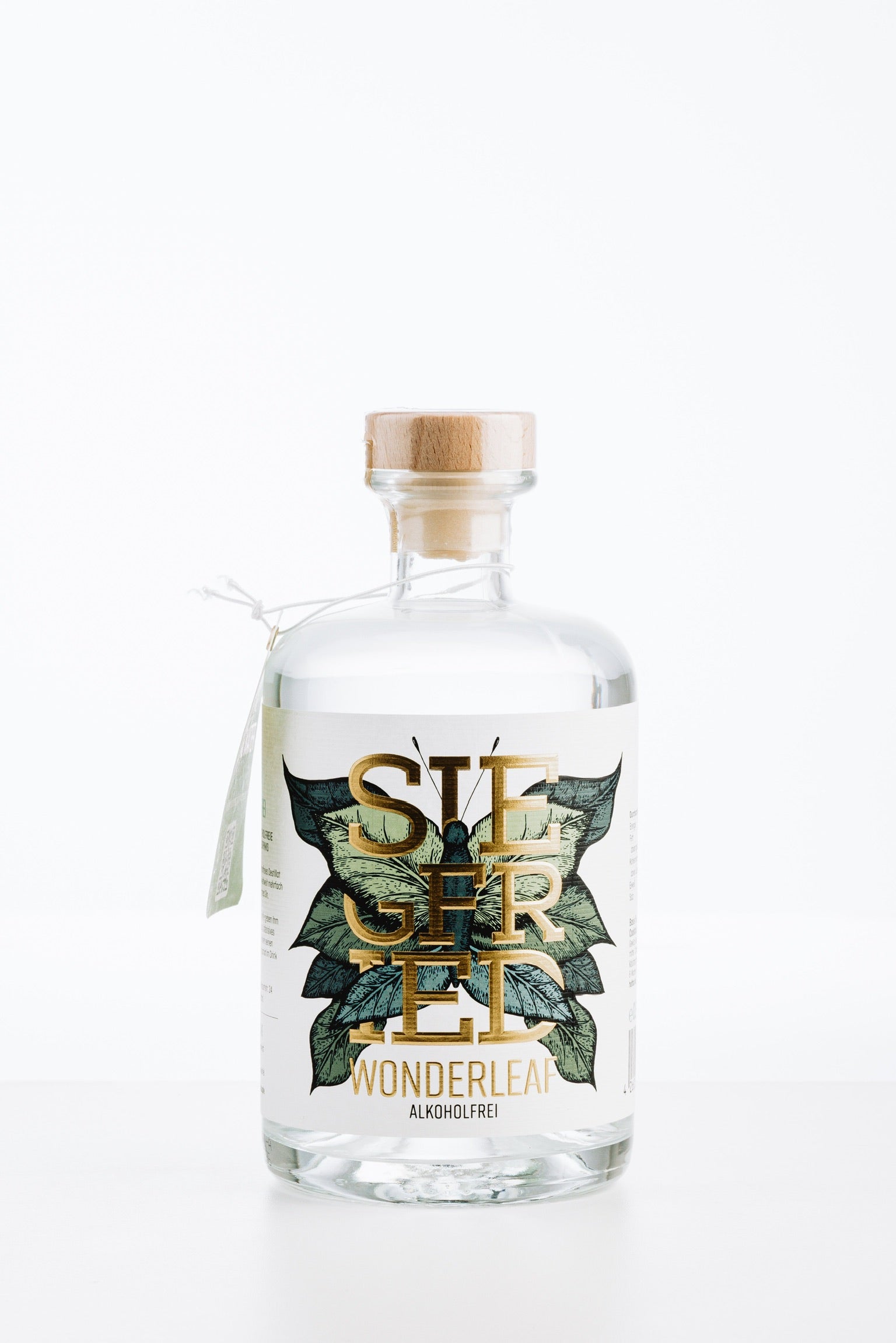 Siegfried Wonderleaf alkoholfrei – Flasche mit gold-grünem Etikett, Holzverschluss und klarer Flüssigkeit, perfekt als alkoholfreie Gin-Alternative mit Tonic